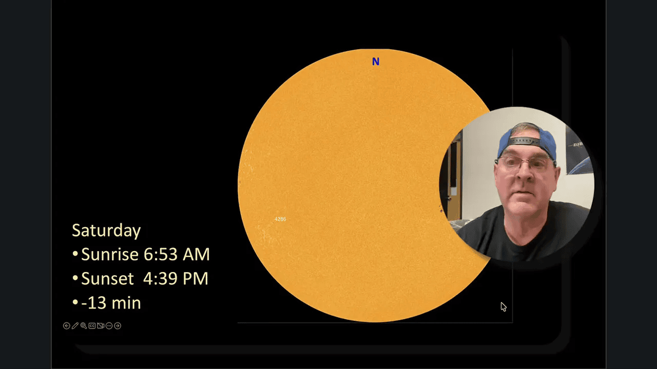 Clear slide showing a sun diagram with text: Saturday • Sunrise 6:53 AM • Sunset 4:39 PM and a small presenter video inset